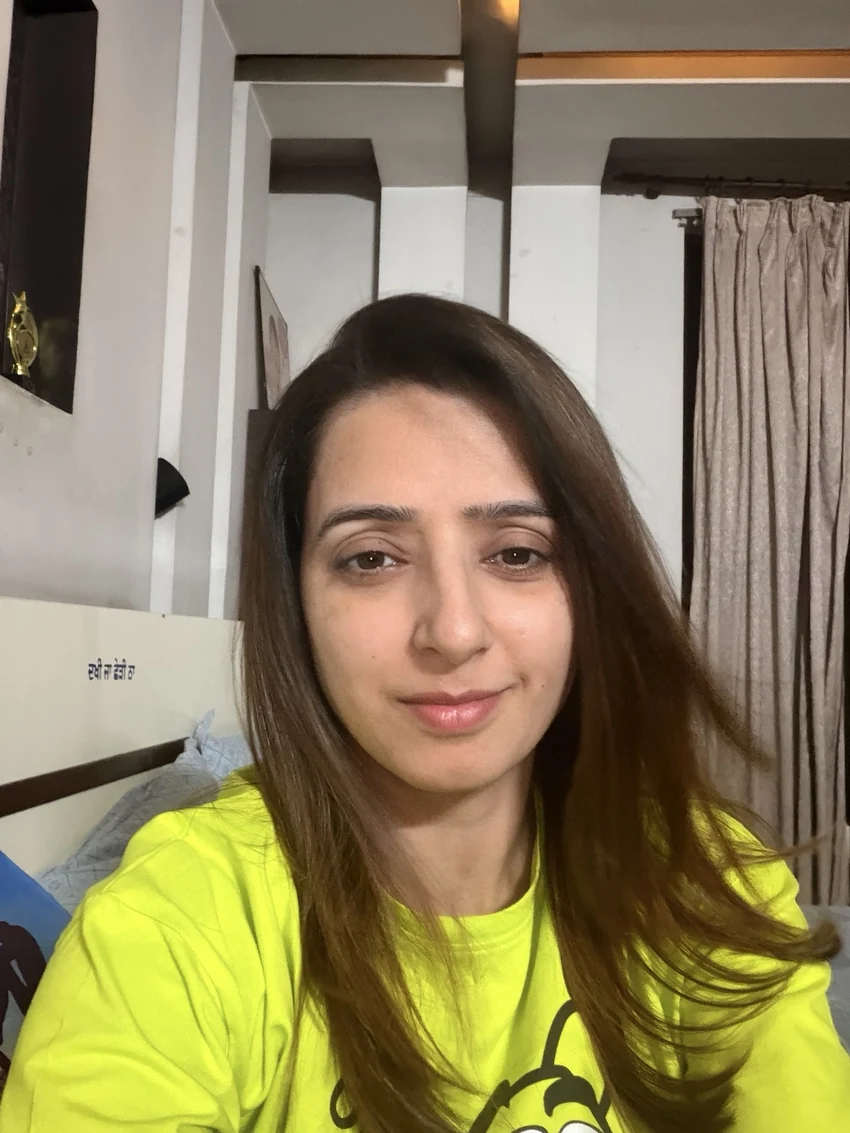 Preeti smiling at home